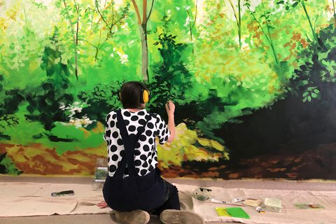 Artist Hannah Brown working on Atrium at the Hellingly Centre Mental Health Unit Photographer Damian Griffiths Courtesy of Hospital Rooms
