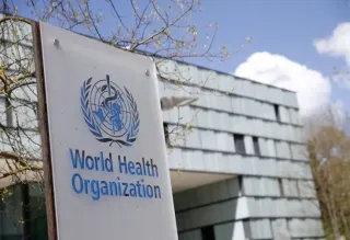 Logo pictured outside building who geneva